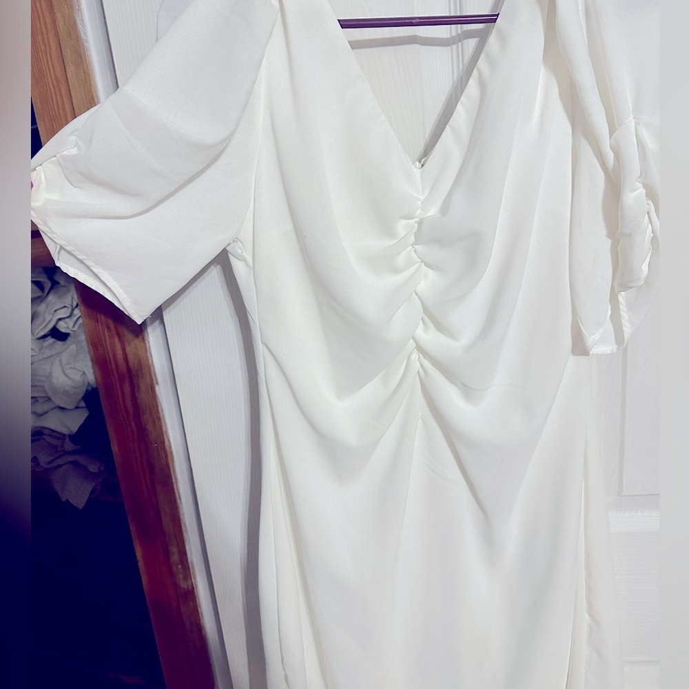 Large fits like medium. Bridal shower dress